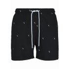 Herrenbadebekleidung // Urban classics Embroidery Swim Shorts black/palmtree